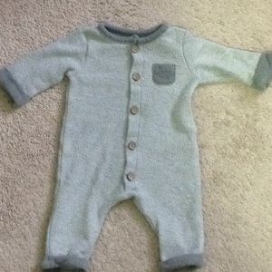 Newborn one piece outfit.